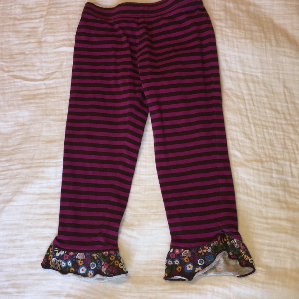 Brown and purple striped pants with floral ruffle